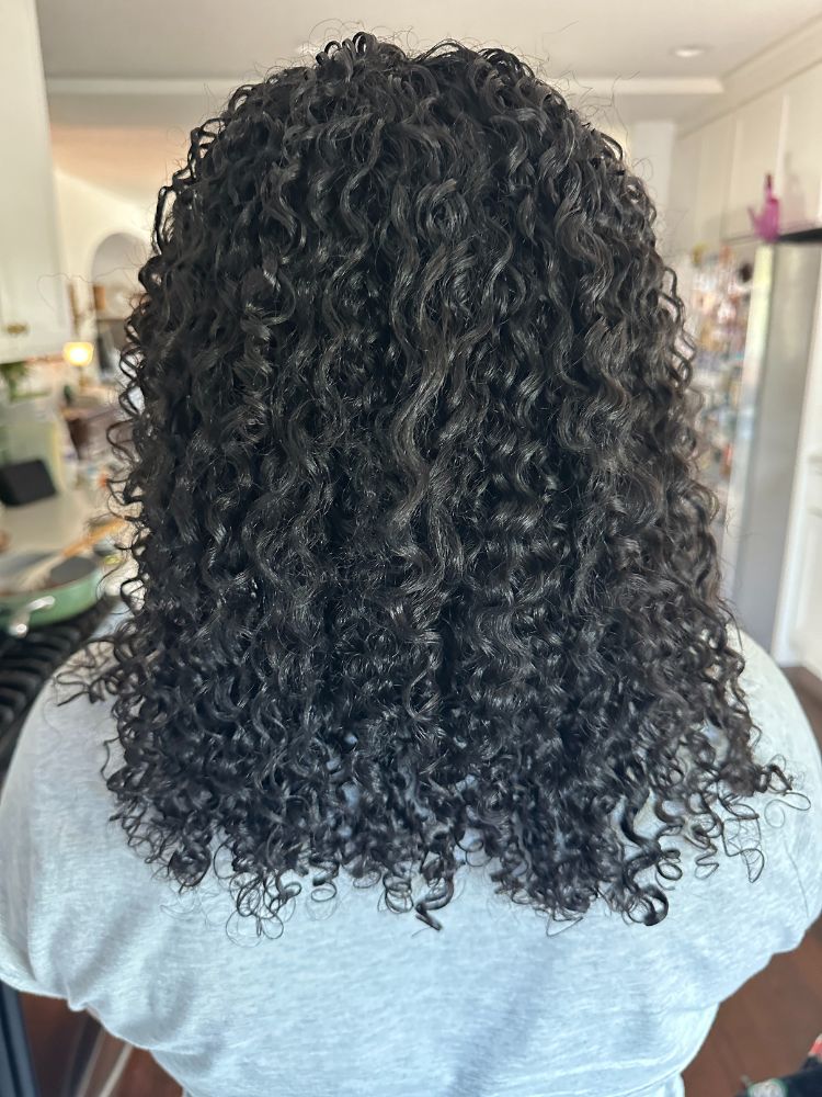 coupe de cheveux bouclée