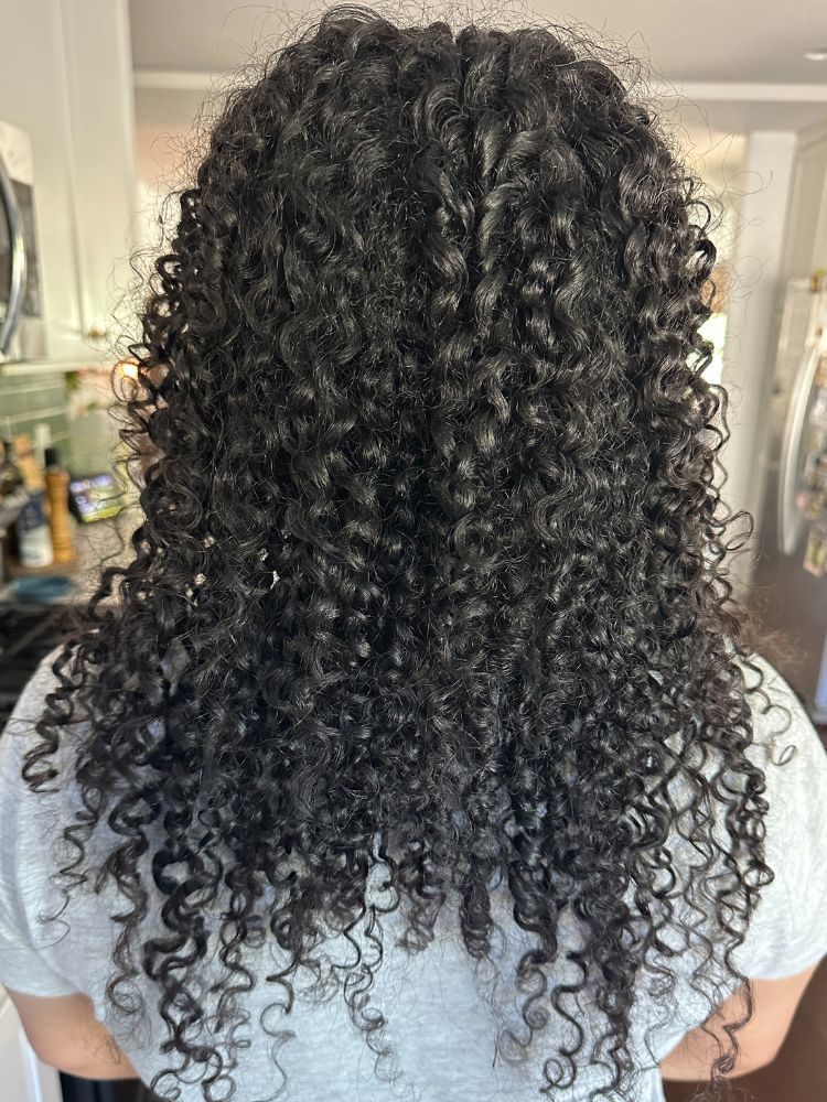 coupe de cheveux bouclée